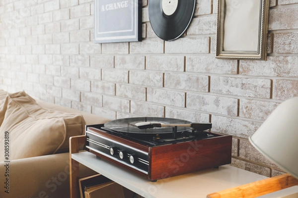 Obraz Record player on table in room