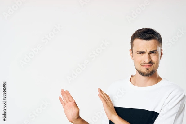 Obraz young man pointing at something