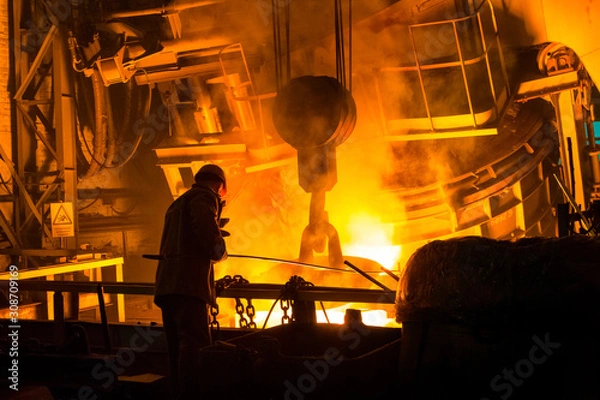 Fototapeta worker work hard on a factory