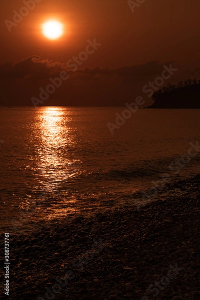 Obraz Red dawn over the sea. Bali Amed.