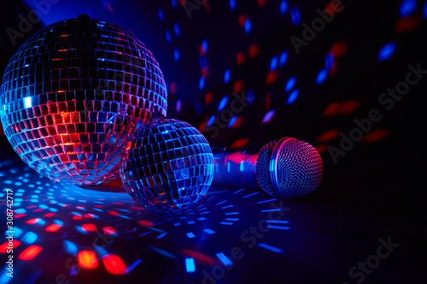 Obraz Microphone and  glittering mirror disco balls. Karaoke club. For advertising or web design. Entertainment or music show background