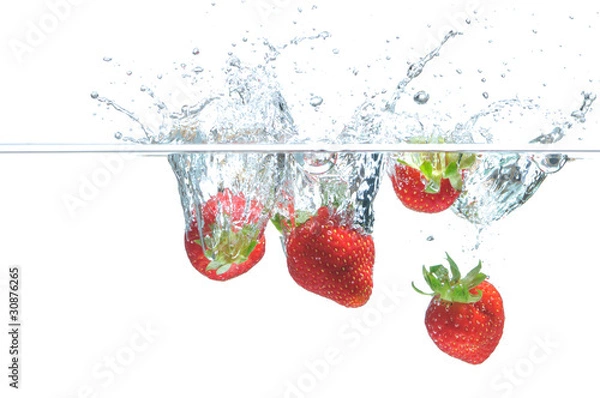 Obraz Strawberry falling in water