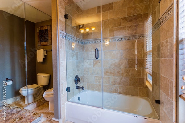 Obraz Custom contemporary modern bathroom with tile work, glass tub enclosure, and mirrors