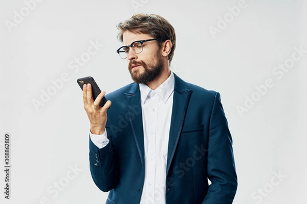 Fototapeta young man with mobile phone