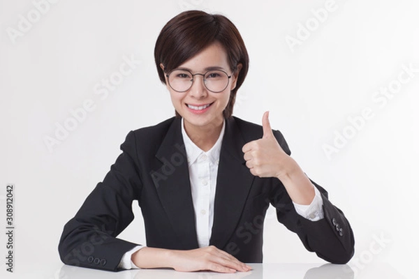 Obraz Young Asian short hair female model in formal dress which is good for business purpose