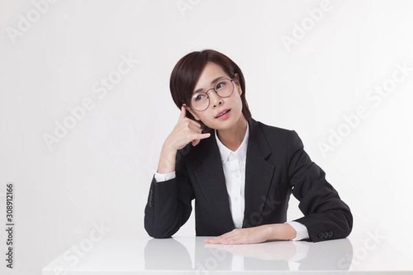 Obraz Young Asian short hair female model in formal dress which is good for business purpose