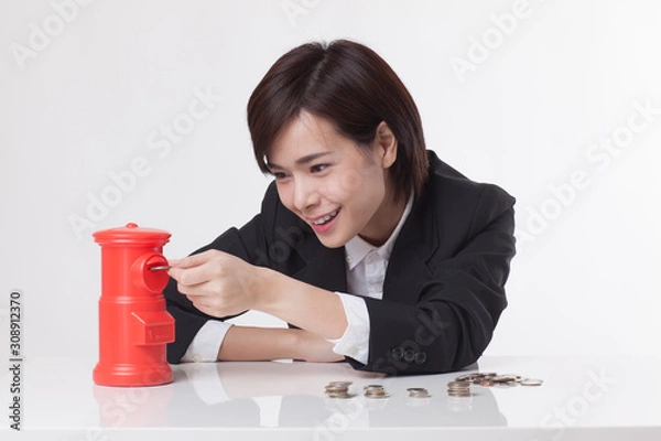 Obraz Young Asian short hair female model in formal dress which is good for business purpose