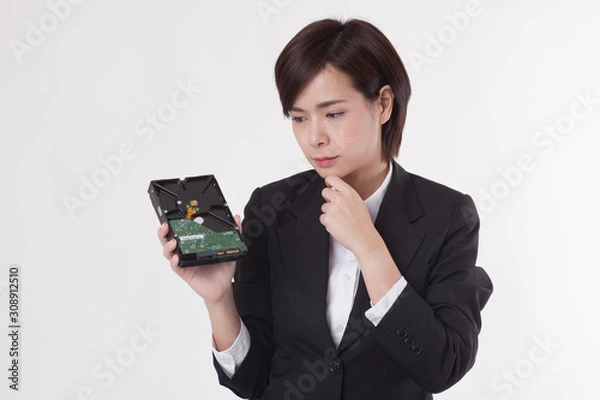 Obraz Young Asian short hair female model in formal dress which is good for business purpose