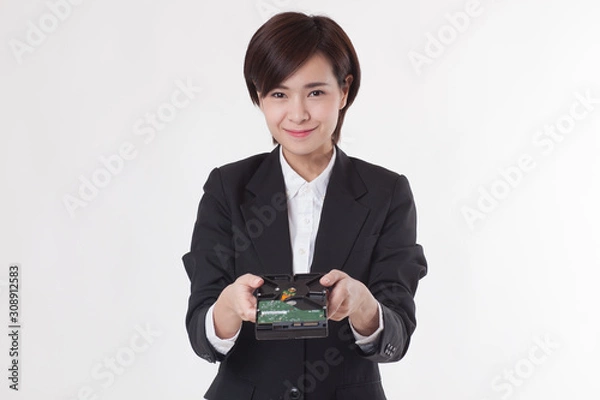 Obraz Young Asian short hair female model in formal dress which is good for business purpose