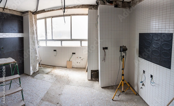 Obraz Panorama of real housing reform: masonry, plumbing, electricity (tiling walls, renovation of water pipes, new complete electrical installation, etc)
