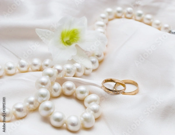 Obraz wedding rings and orchid