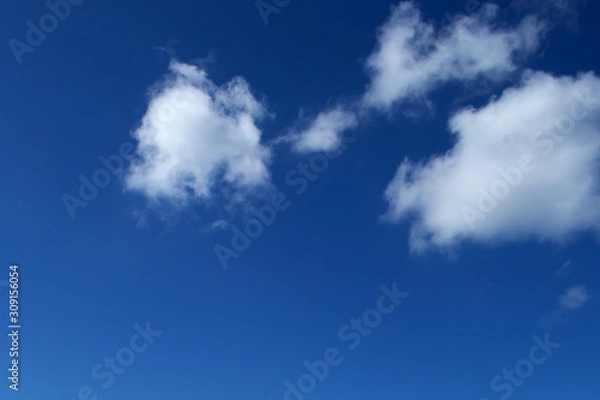 Obraz blue sky with white clouds