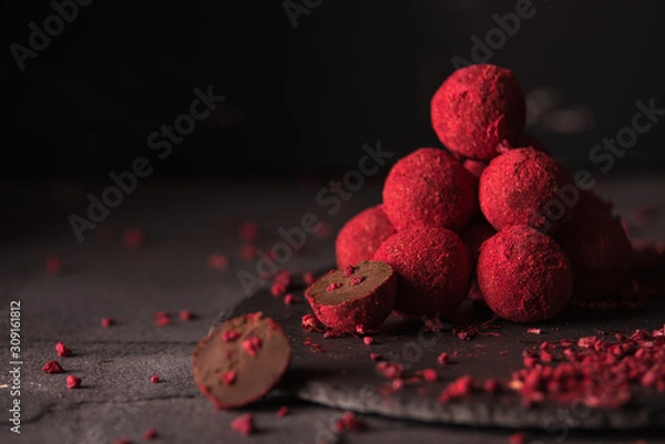 Obraz chocolate truffle with raspberry powder
