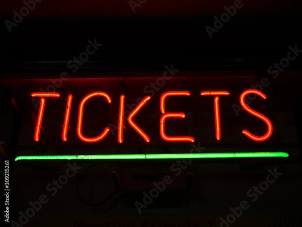 Obraz Glowing red neon tickets sign