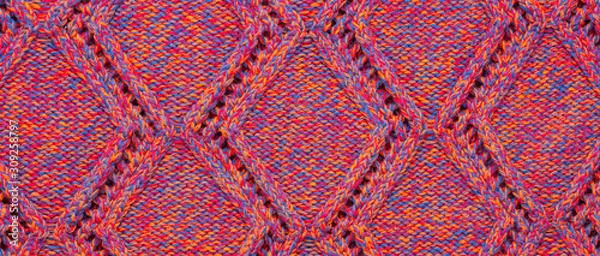 Fototapeta Knitted sweater texture. Pink melange rhombus pattern. Background. Banner. Copy space