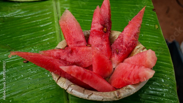 Obraz Watermelon on banana leaf