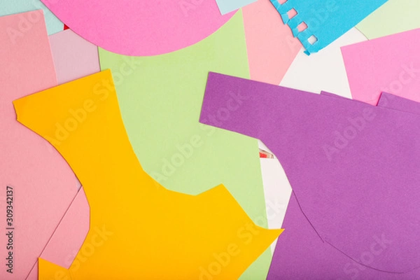 Fototapeta segments of colored paper on the table