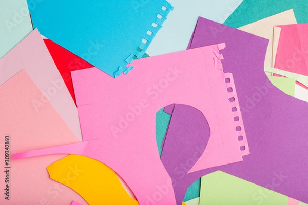 Fototapeta segments of colored paper on the table