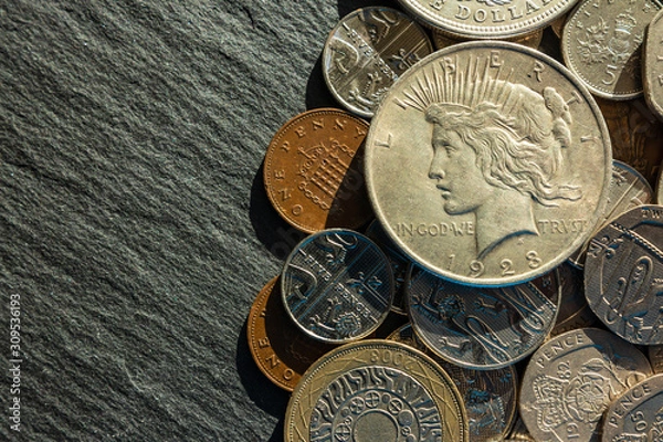 Fototapeta background. copper and silver coins of various denominations and values. dollar.