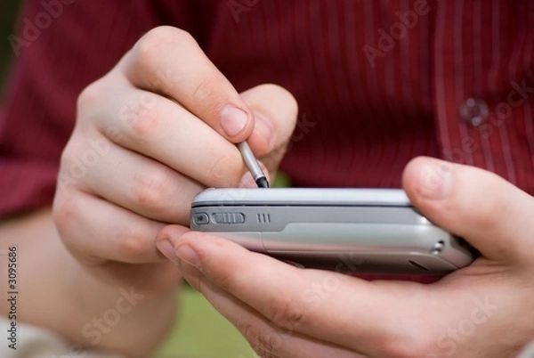 Obraz taking notes on pda