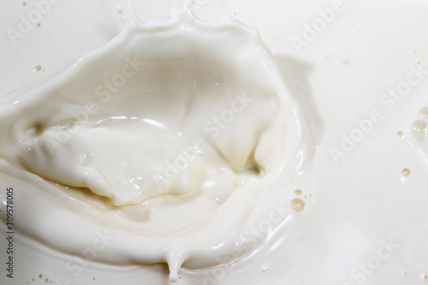 Fototapeta Close up of milk splash