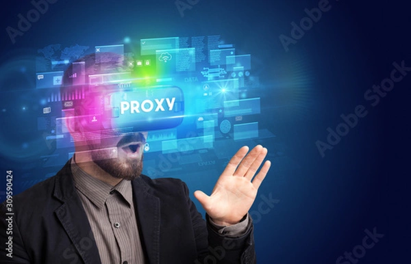 Fototapeta Businessman looking through Virtual Reality glasses with PROXY inscription, innovative security concept