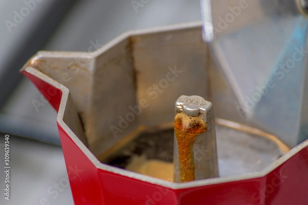 Obraz Making black moka coffee using moka coffee maker close-up