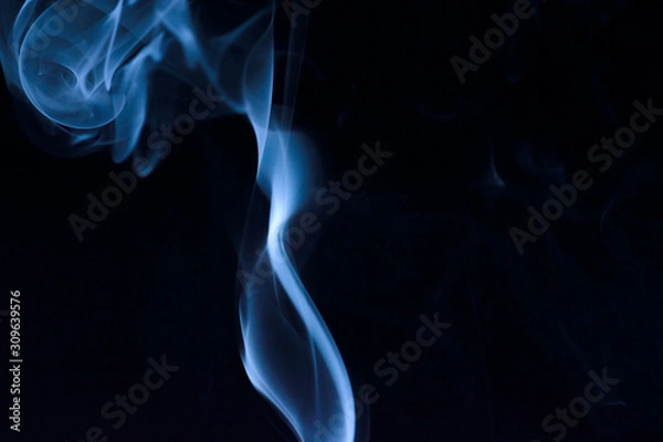 Obraz Cigarette smoke trail slowly evaporating background