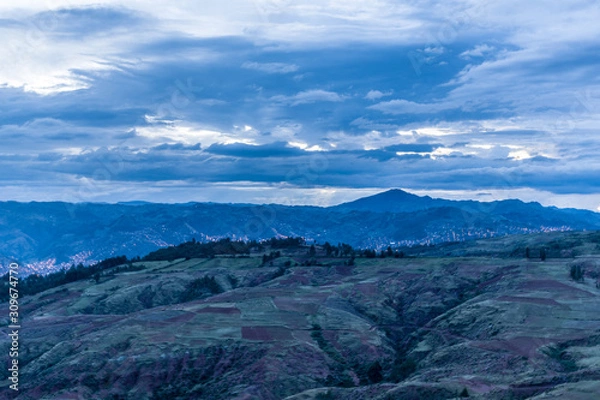 Fototapeta  mountains near trees and cloudy sky