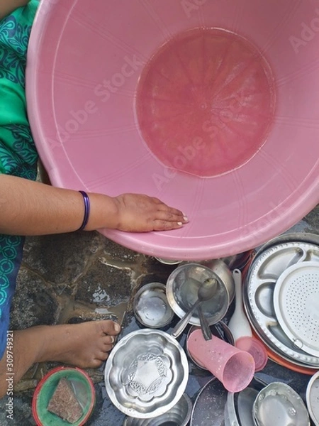 Obraz Cleaning the utensils.
