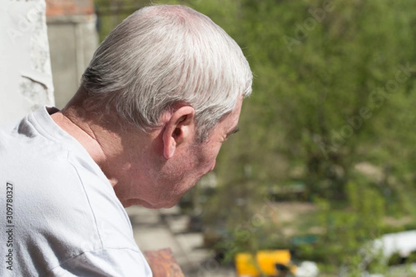Fototapeta Sad old man.