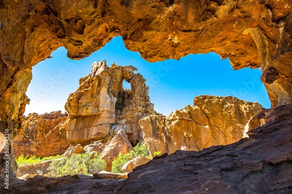Fototapeta View from cave to bizarre rock formation at Stadsaal, Cederberg Wilderness Area, South Africa