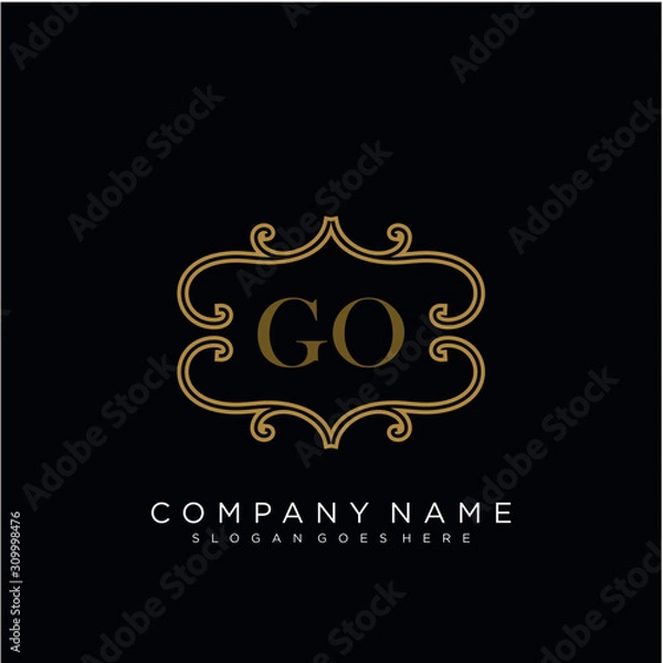 Fototapeta  Initial letter GO logo luxury vector mark, gold color elegant classical 