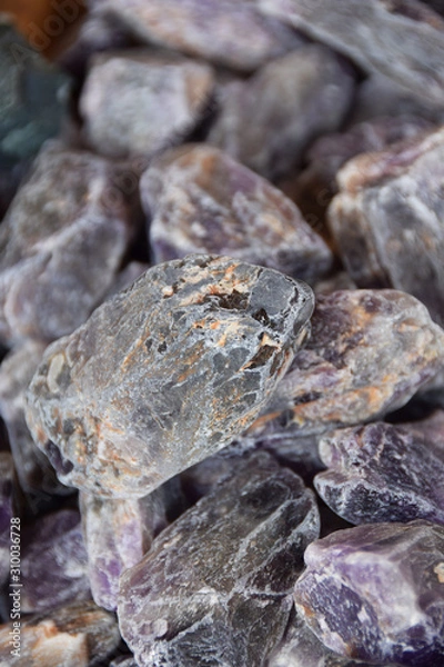Obraz stones of different colors on the stall