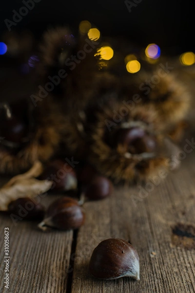 Obraz chestnuts on rustic table