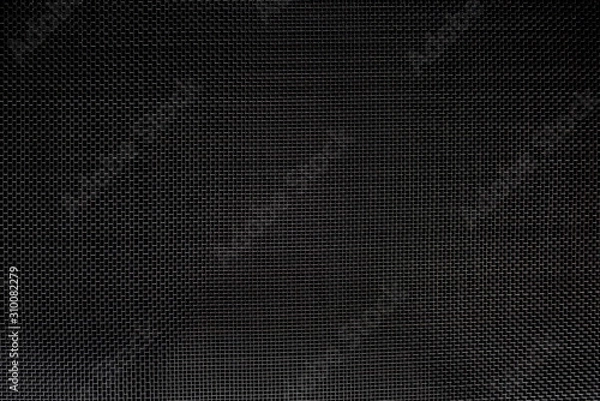 Obraz Texture of diagonal and rectangular metal lattice fine weave lattice on black background