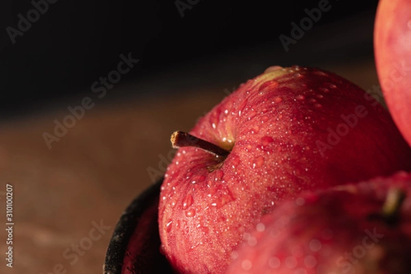 Obraz Apple close up with dramatic light and water