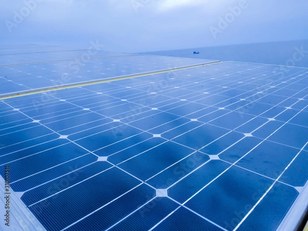 Obraz Close-up of Solar energy panel photovoltaics module in the sea offshore.