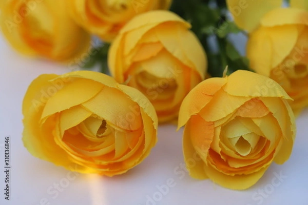 Fototapeta 布で作られたオレンジのバラの花