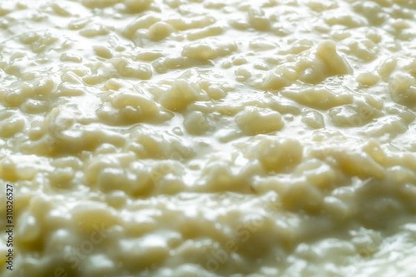 Fototapeta close-up photograph of rice pudding with backlight and shadows