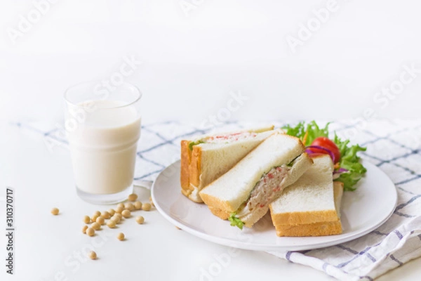 Fototapeta Healthy Sandwich : Stuffed crab sandwich with shrimps on white plate and soy milk.