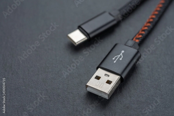 Obraz Type C USB cable with cable against a dark background.