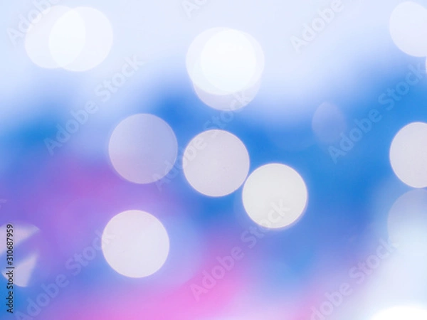 Fototapeta Christmas tree ornament detail blur abstract background. Classic blue color of the year 2020