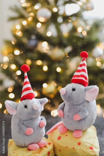 Fototapeta Little mouse toy, symbol of 2020. new year decoration. New Year 2020 Symbol. Greeting Christmas card.  Selective focus.