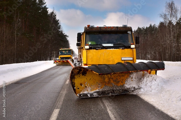 Obraz Snowplow vehicle working
