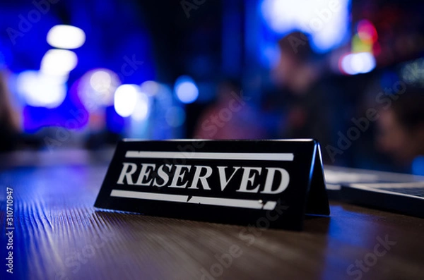 Fototapeta Table reservation sign close up. Ready for a party