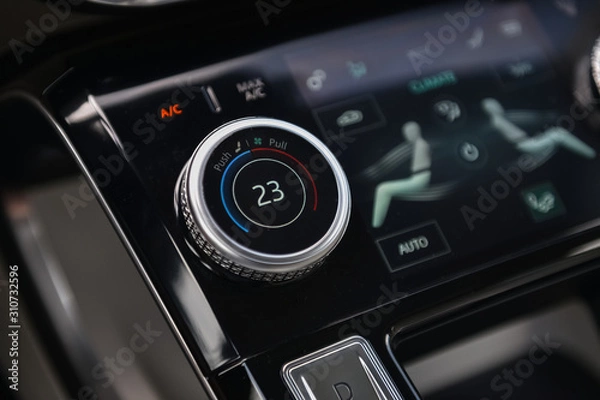 Fototapeta Temperature button and climate control in a car.