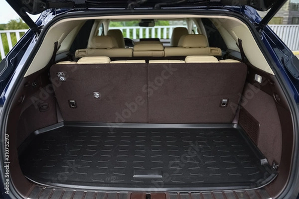 Fototapeta Empty, opened car trunk