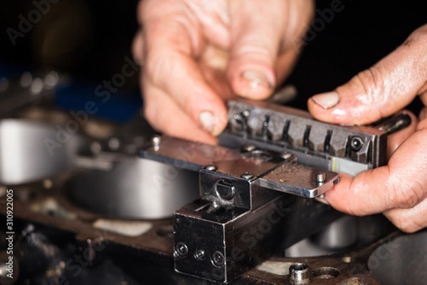 Obraz Car engine repair at the factory.