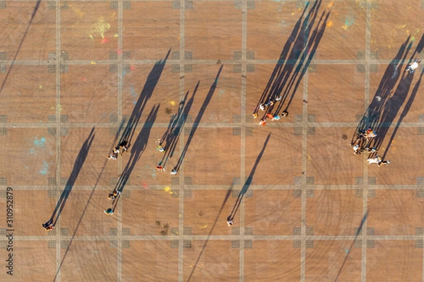 Obraz A crowd of children playing in the city square, holiday, top view